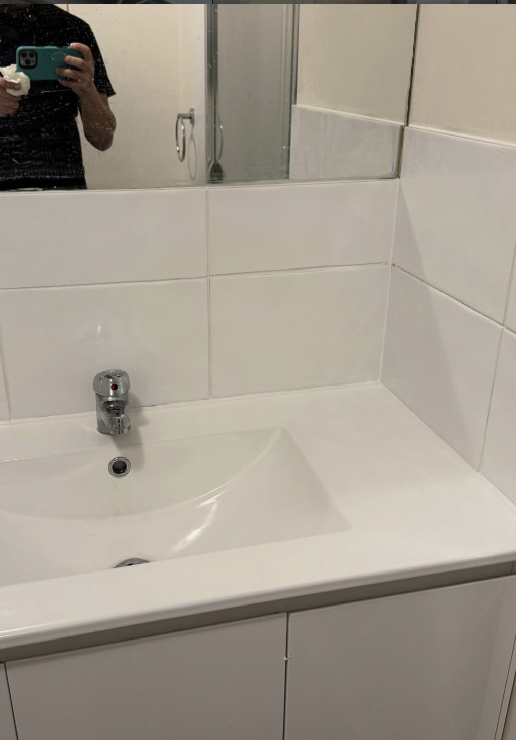Tiling and vanity restored to a clean finish